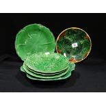 Six 19th Century Green Glazed Circular Leaf Plates Together With A Similar Majolica Plate