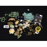 A Bag Of Costume Jewellery