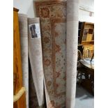 Two 20th Century Belgian Manufacture Cream Ground Floral Patterned Floor Rugs