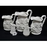 A Group Of Thirteen Portmeirion Parian Ware Moulded Jugs Of Various Sizes