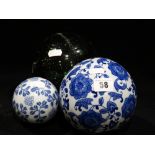 A Selection Of Blue & White Transfer Decorated Carpet Bowls, Together With Two Green Glass Floats