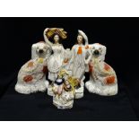 A Pair Of Staffordshire Pottery Seated Dogs Together With Two Further Staffordshire Pottery
