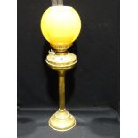 A Circular Based Brass Column Oil Lamp