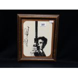 A Hand Signed Black & White Promo Photo Of Clint Eastwood, The Signature In Black Marker Pen