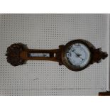 An Edwardian Oak Framed Wall Barometer With Circular Dial