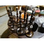 A Quantity Of Oak Twist Candle Holders (10)