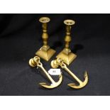 A Pair Of Brass Ships Anchor Wall Mounts, Together With A Pair Of Brass Candle Holders