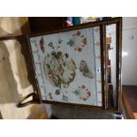 An Oak Framed Wool Work Fire Screen