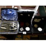 A Cased Silver Handle Manicure Set Together with Two Collectable Coin Sets