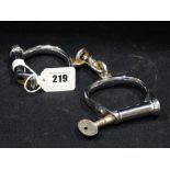 A Pair of Vintage Steel Handcuffs And Keys