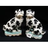 A Rare Pair Of 19th Century Staffordshire Pottery Dogs On Cushion Bases Each with Smoking Pipe (