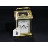 A Brass Encased Carriage Clock With Key