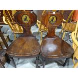A Pair Of 19th Century Mahogany Hall Chairs with Family Crest And Anchor Motifs 636