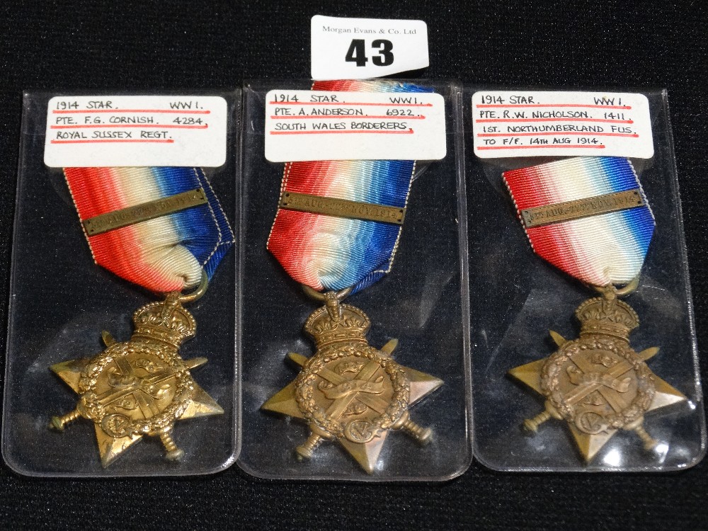 Three 1914 Stars Each with Bar To R.W Nicolson 1411 1st Northumberland Fusiliers, Pte A. Anderson