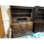 An 18th Century and Later Oak Welsh Dresser, The Rack Having Two Shelves With An Arrangement of