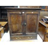 An Antique Oak Two Door Wall Cupboard with Base Drawer 29 Inches Wide