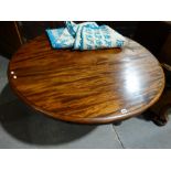 A 19th Century Circular Topped Tilt Breakfast Table on A Trefoil And Claw Base 52 Inches Diam