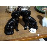 A Pair of Staffordshire Pottery Jackfield Seated Dogs, Separate Front Leg