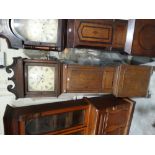 An Antique Oak Long Case Clock, The Hood Enclosing A Square Painted Dial With 8 Day Movement, Signed