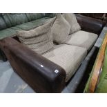 A Contemporary Brown Leather Upholstered Settee