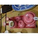 A Pink Glazed Dressing Table Tray And Pieces