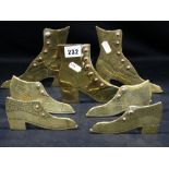 3 Pairs of Antique Brass Fire Side Shoes Together with A Single Shoe