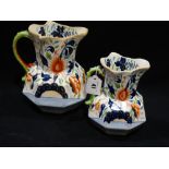 Two 19th Century Graduated Ironstone Octagonal Jugs With Serpent Handles