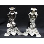 A Pair Of Spelter Cherub Column Lamp Bases