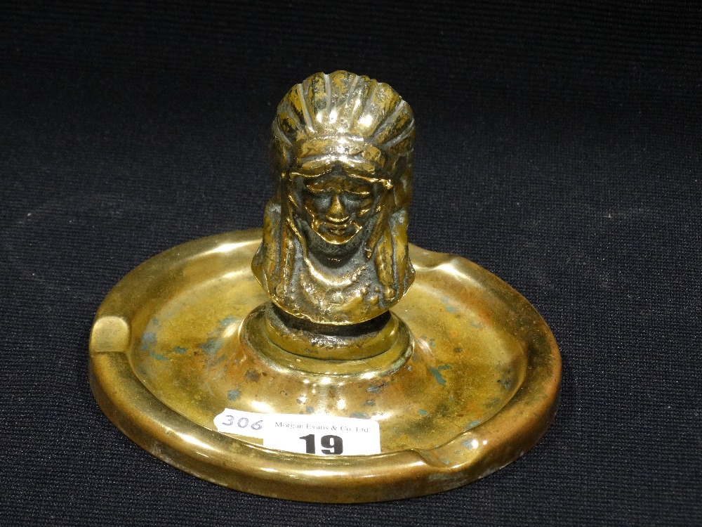 A Brass Advertising Ashtray Featuring A Native Indian Head