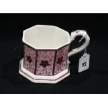 A 19th Century Staffordshire Pottery Pink Lustre Decorated Octagonal Tankard With Serpent Handle