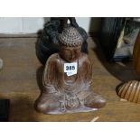 A Carved Wooden Budda Figure