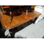 A Victorian Mahogany Extending Dining Table On Reeded Supports