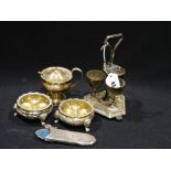 A Small Group Of Plated Ware To Include A Novelty Cocktail Shaker, A Pair Of Circular Salts Etc