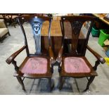 A Pair Of Early 20th Century Oak Splat Back Carver Chairs