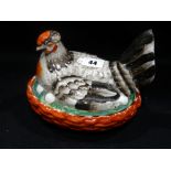 A Staffordshire Pottery Coloured Hen On Nest, 7" Across