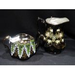 A Black Lustre Pottery Teapot & Hot Water Jug