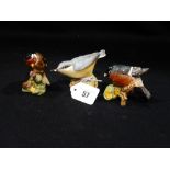A Royal Worcester Model Nuthatch, Together With Two Beswick Birds, Bullfinch & Goldfinch