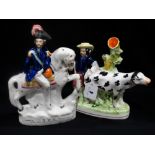 A Staffordshire Pottery Equestrian Figure "Albert", Together With A Staffordshire Pottery Cow &