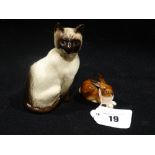 A Beswick Model Seated Siamese Cat, Together With A Royal Doulton Miniature Rabbit