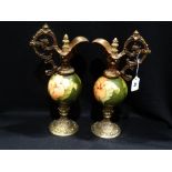 A Pair Of Circular Based Moorcroft Pottery & Gilt Metal Ewers