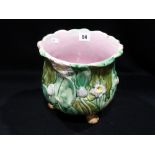 A Three Footed Majolica Glazed Jardiniere With Moulded Floral Pattern, 8" High