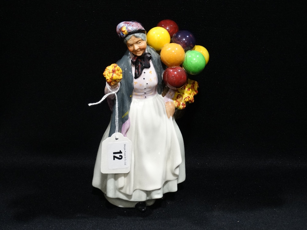 A Royal Doulton Figure, "Biddy Penny Farthing" Hn1843