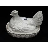 A Staffordshire Pottery White Glazed Hen On Nest