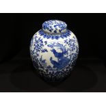 A 20th Century Oriental Circular Based Blue & White Ginger Jar & Cover, 11" High