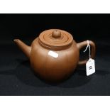 An Oriental Clay Circular Based Teapot, Seal Mark To The Base