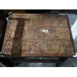 An Unusual Carved Hardwood Coffee Table, Depicting African Figures & Wildlife