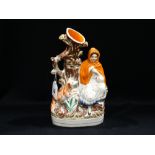 A Staffordshire Pottery Red Riding Hood Spill Holder Vase