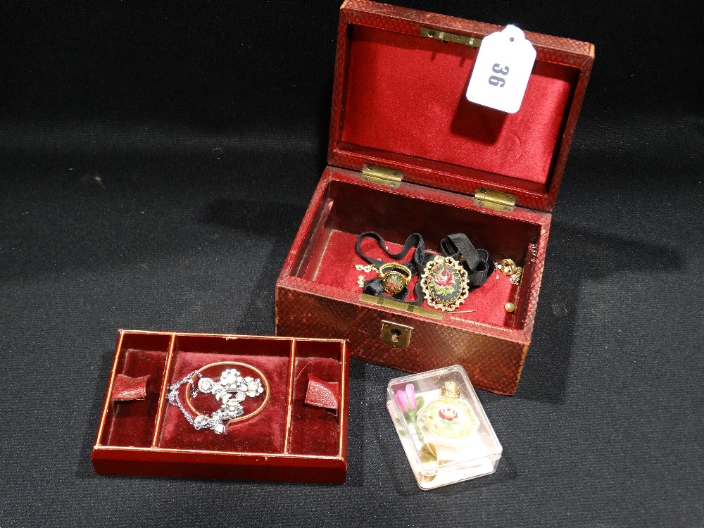 An Edwardian Leather Covered Jewellery Box, Together With Some Contents