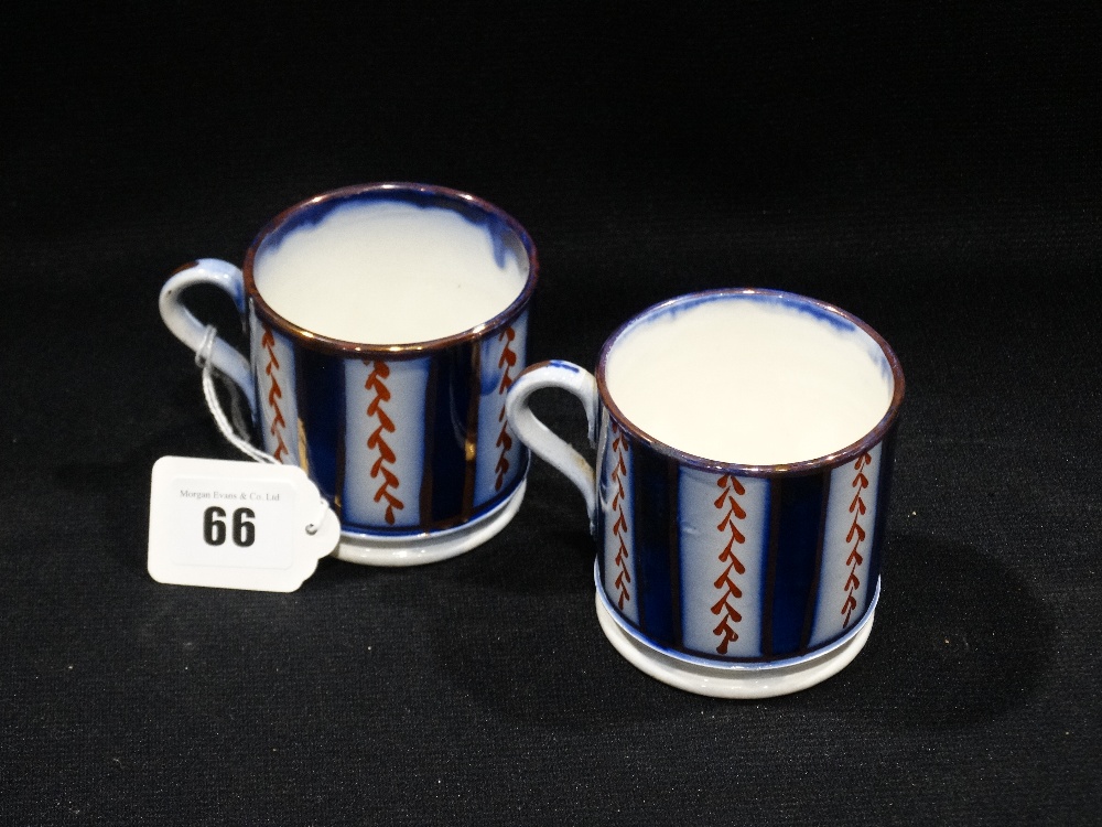 A Pair Of Staffordshire Pottery Gaudy Welsh Mugs