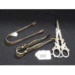 A Pair Of Victorian Grape Scissors, Together With Two Pairs Of 19th Century Sugar Grips